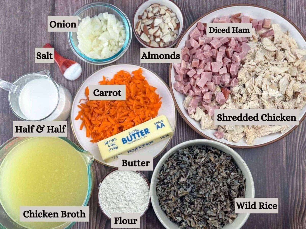 Ingredients for Minnesota wild rice soup: chicken, ham, carrot, wild rice, flour, broth, half and half, butter, salt, almonds, onions, carrot.