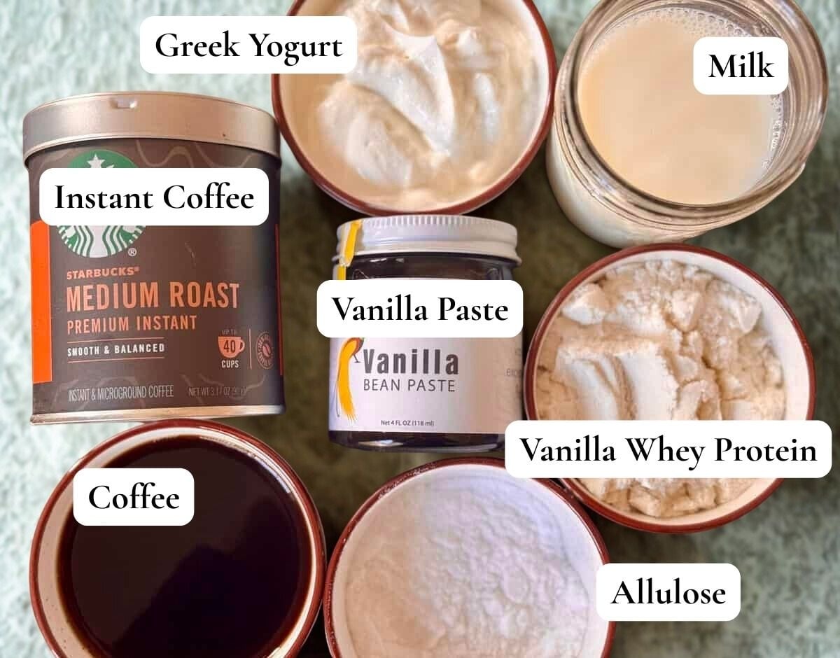 Ingredients for the coffee protein ice cream arranged on a stone backdrop.