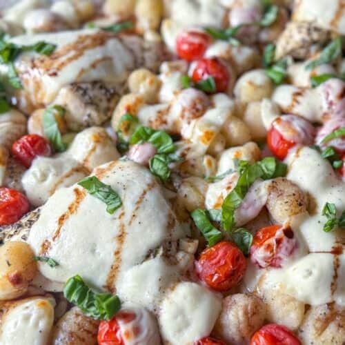 close up of the sheet pan caprese chicken with balsamic drizzle
