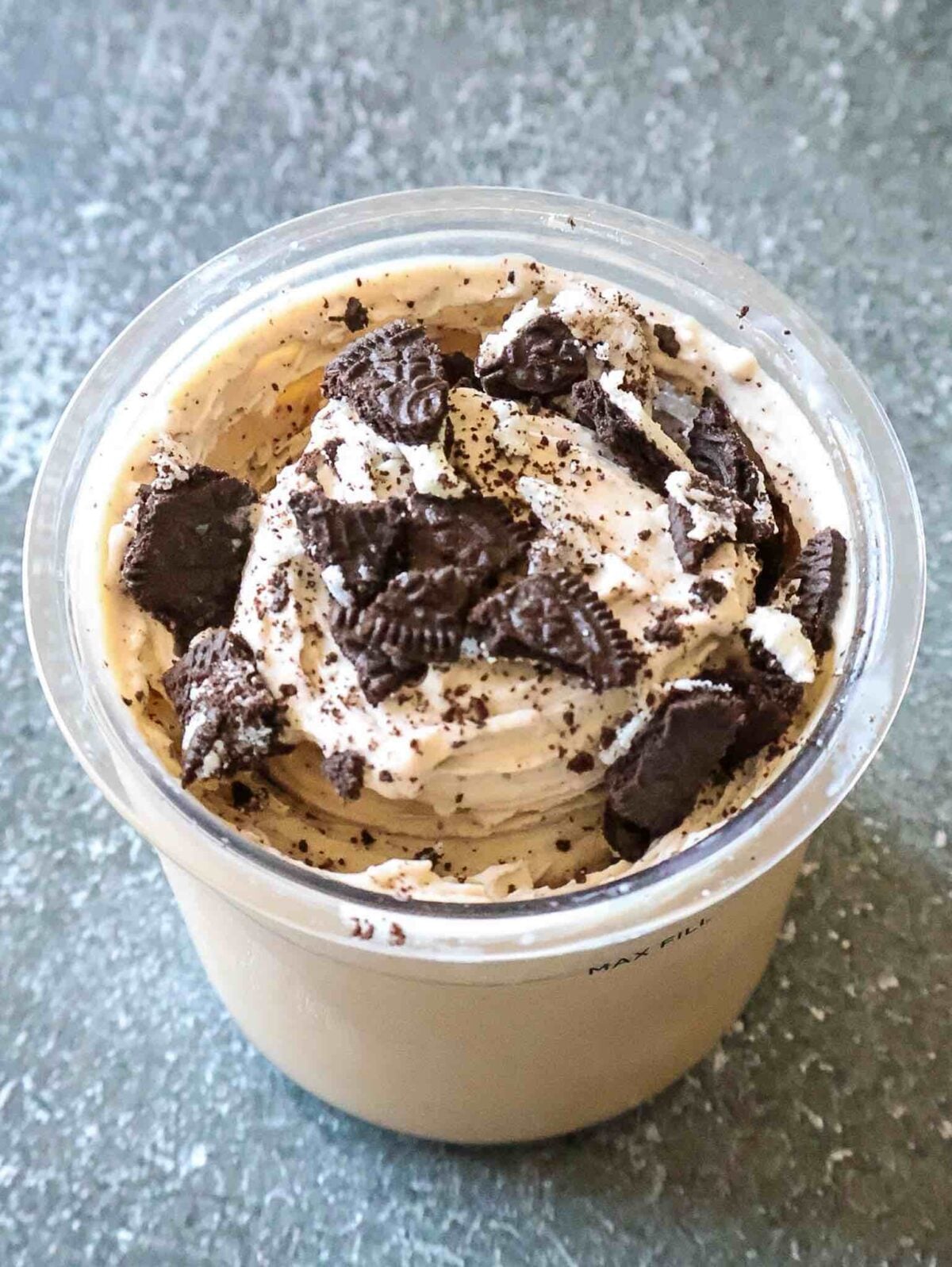 Ninja Creami pint container topped with oreo.