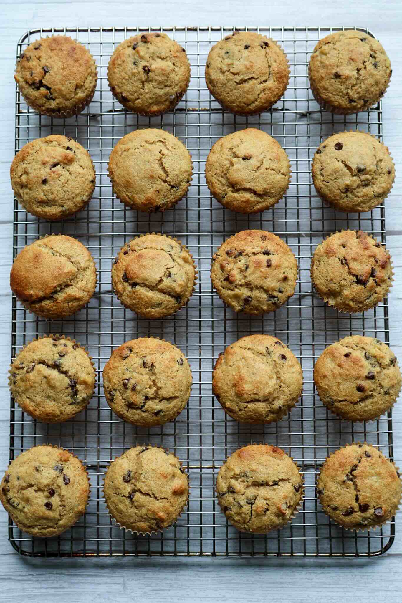 A cooling rack filled with muffins.