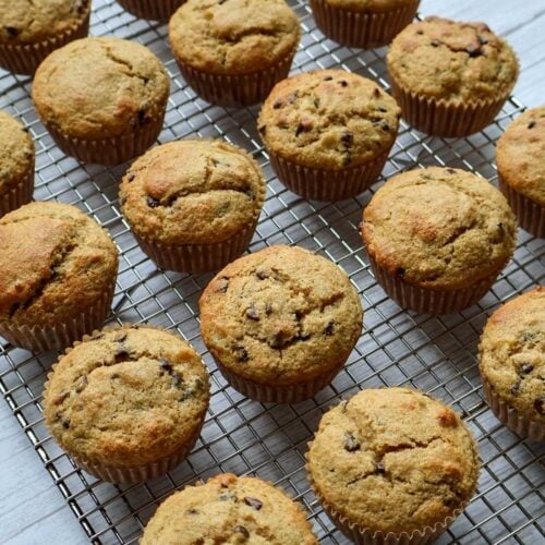 Whole Wheat Banana Muffins cooling on a rack.
