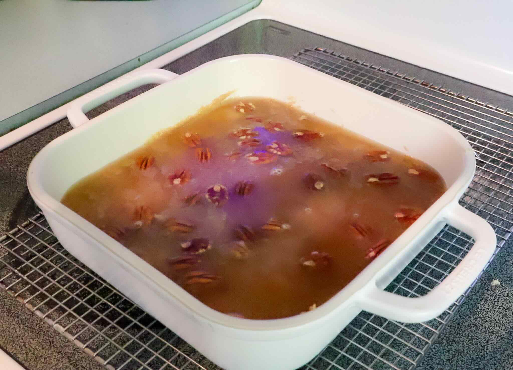 Apple cake topped with boiling water before baking.